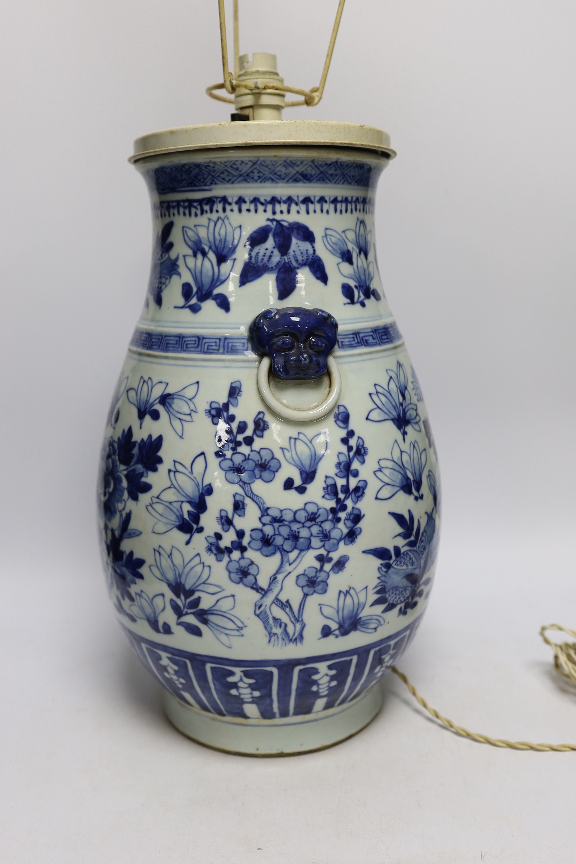 A late 19th century Chinese export porcelain blue and white Hu vase, painted with peaches (converted to a table lamp, drilled), vase 38.5cm